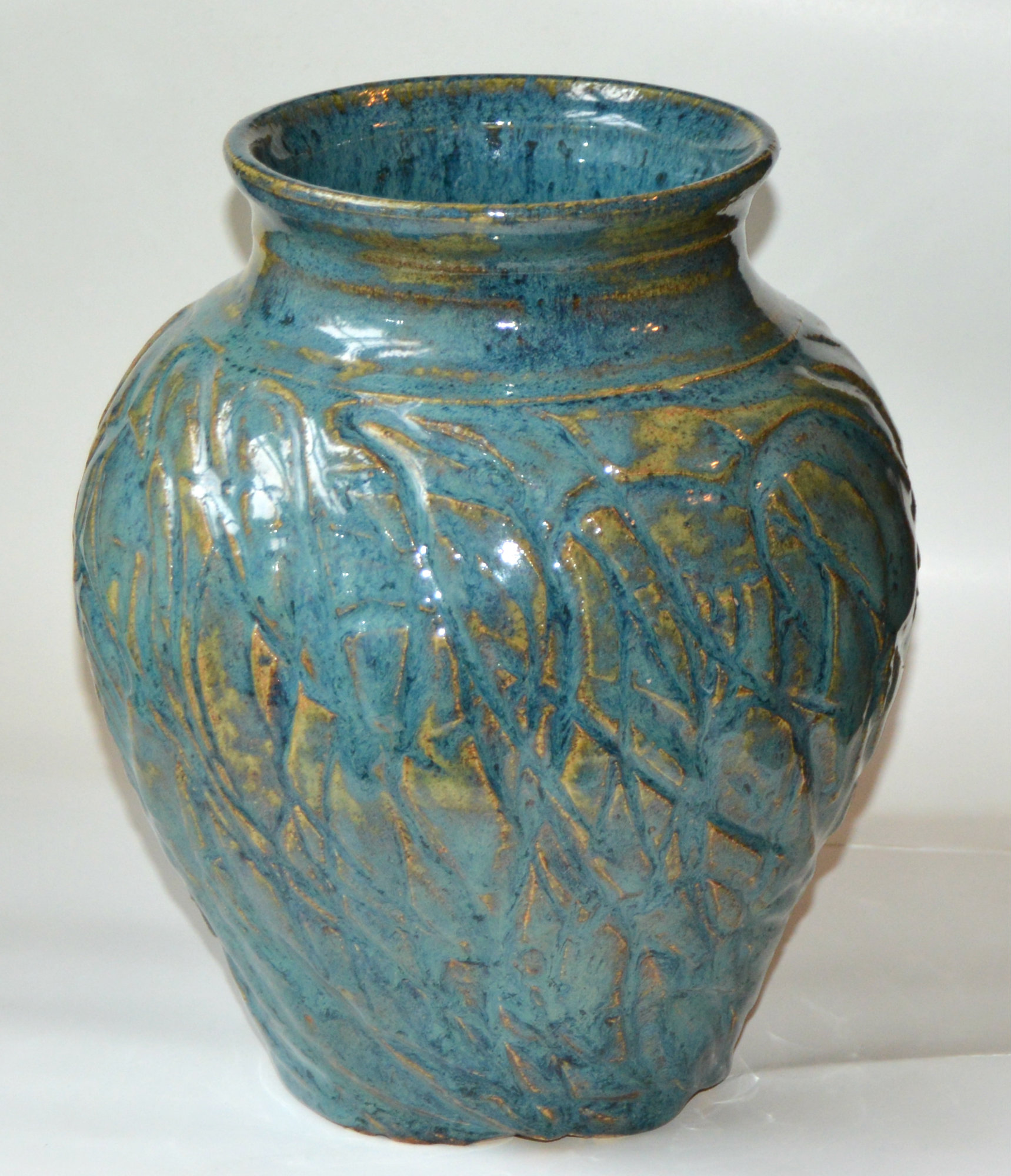 Blue and gold clay vase